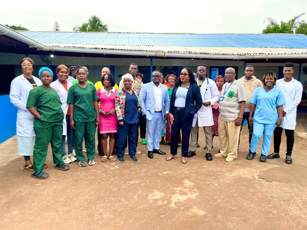 CAMF staff and partners group photo outside the medical center