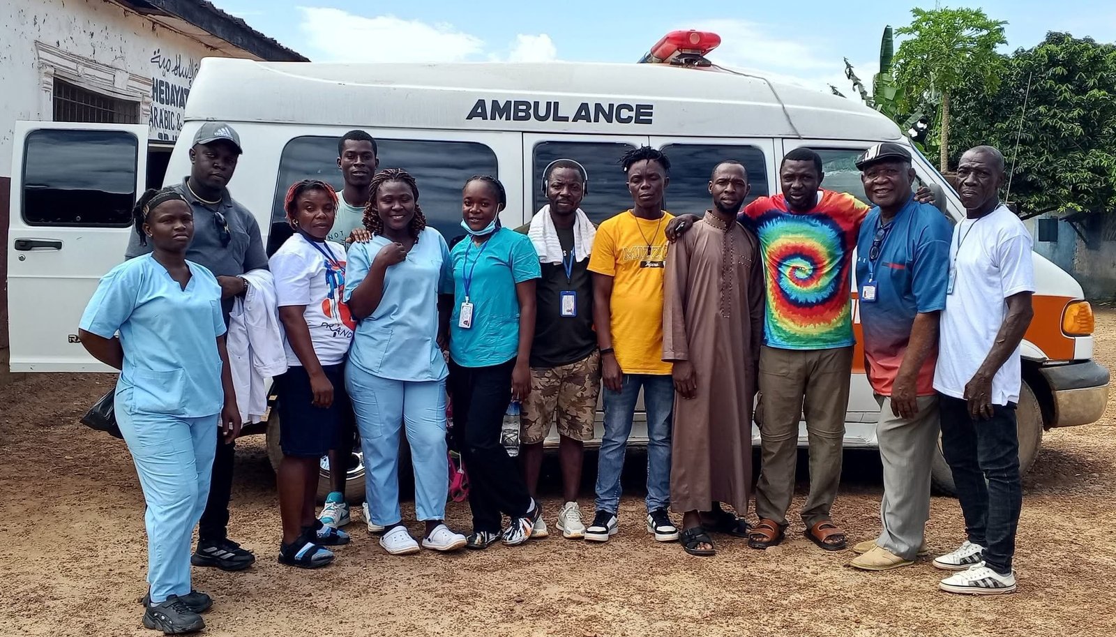 CAMF staff and community members outside the medical center